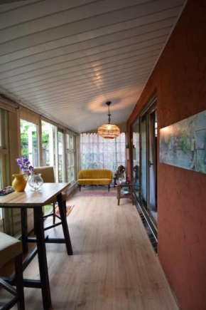 Romantische, knusse woning met een geheime tuin